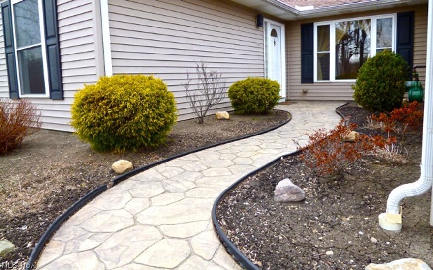 Beautifully maintained 4 bedroom sprawling vinyl sided ranch on over half wooded lot in the French Hollow area, stamped concrete walkway to front door w/glass block side windows, 8’ ceramic entry foyer 2 full baths, Vaulted family room with skylight and wood laminate flooring plus a see through brick fireplace (custom FP doors) which is also in the formal living room, wood laminate floors in oak eat in kitchen plus new appliances in ‘07, newer carpeting (’07), utility room with entry door, Office/exercise room w/glass block window, 11’ storage room next to furnace room, new HW tank in ’13, stamped concrete patio, spacious deck, 14 yr old furnace, central air and roof, 9 year old windows,2 car attached garage , park like yard, plus 12 month home warranty.