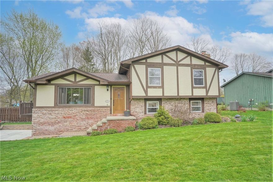 Just in time for summertime fun - INGROUND HEATED POOL at this 4-bedroom, 1.5 bath Split Level on .34 acres!!  Well kept 3-level split with 4th level as attached, heated 2-car garage.  Enter the bright Living Room that opens up to Eating Area with sliders to wrap-around Deck that overlooks the inviting in-ground pool.  Eating area is open to updated, applianced Kitchen which wraps back around to Living Room or the upstairs or down to finished lower level.  Upstairs includes 3 Bedrooms and full Bathroom that is connected to main Bedroom and hallway.  Lower level includes fireplaced Family room, 4th Bedroom or office, Laundry area, half Bath and entry to heated garage.  Deck on two sides of house overlooks fenced-in pool and patio underneath deck, firepit, 2 pergola's, shed, and large backyard with electric dog fence.  Home Warranty included.  Make your appointment today to see your new HOME!!!