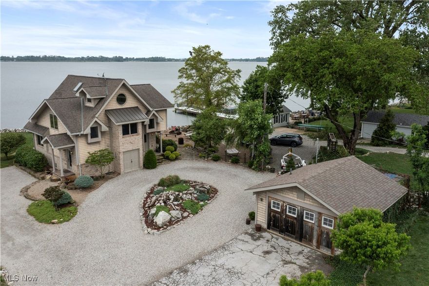 RARE INVESTMENT OPPORTUNITY to own a highly successful, TURNKEY VRBO property, The Lake House at Cedar Point (#220710) boasting a proven six-figure NOI and exceptional occupancy history. This LOMA-certified luxury waterfront retreat underwent a premium-grade full remodel in 2006 and is an approved transient rental. The offering includes two parcels with nearly 37' of private beach lake frontage and 151' of bay waterfront and dockage. The main home features 5 bedrooms, 2 full baths and 1 half bath. The guest house offers a second primary suite with an additional full bath and serves as the 6th bedroom, while the detached game room, complete with an additional half bath, could serve as a 7th bedroom. Enjoy captivating water views, upscale finishes, and turn-key ownership everything stays, including watercraft and all furnishings. This is a one-of-a-kind chance to own a luxury waterfront investment near Cedar Point with a strong income stream and endless lifestyle appeal!