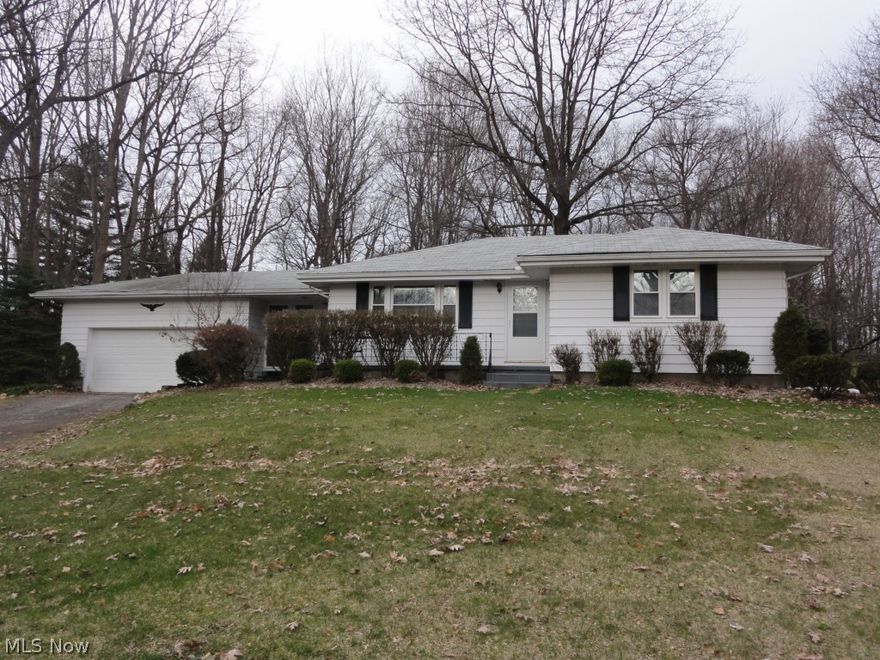 Welcome to 537 Alandale located in the heart of Tallmadge!  This home has been well cared for and has it all:  3 beds, 2 full baths, a nice formal living area and a very functional family room off the large kitchen, a 240 sq/ft 3 season room leading to beautiful brick patio perfect for entertaining family and friends.  There is a possible 4th bedroom in the basement along with a giant rec room including a wet bar and the spacious laundry room!  In addition, the home has an attached 2 car garage and a turn-around offering extra parking.  The home sits on a beautiful .71 acre lot; the view is picturesque.  Numerous updates have been completed including:  New front, garage and storm doors, new kitchen and bathroom faucets, new sub floor and vinyl floor in main bath, 3 new celling fans, beautiful new carpet in the living and family room, a new over-the-range microwave and dishwasher and some fresh paint all in 2015!!  Other updates include attic insulation '13, electrical '12, windows '12,