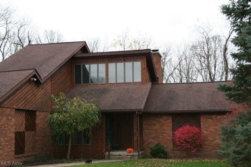 Beautiful home in the country with two decks and a fire pit. Vaulted pine ceilings, stone fireplace, brick fireplace in the master, cherry cabinets & island, granite counter tops and stainless steel appliances. "A Must See".