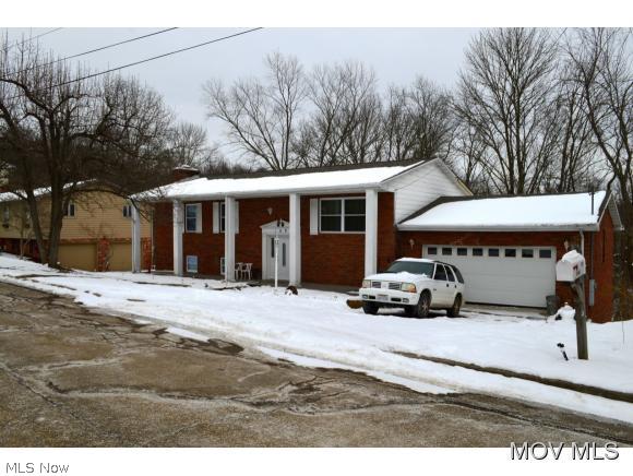 This home has been 95% redone in the last 9 months. New roof, windows, HVAC, electrical, plumbing, new maple kitchen cabinets with self closing drawers and new appliances, French door off eating area of kitchen takes you to back deck over looking woods or open to living room, master suite with new full bathroom, 2nd full bath completely redone, new carpet, paint, and engineered hardwood floors. Spacious family room in basement is l-shaped 13x25x13x13 and offers door to lower back deck, in additional to spacious rec room. Move in ready! Interior of home is brand new! Elem: Putnam Elementary School Elem/Bus: N JrHigh: Marietta Middle School School JrHigh/Bus: N High: Marietta High School High/Bus: N Fire: CIT Police: CTY ;SQFT=Fin L1:1392, Fin Bsmt:1280, Fin Above:1392, Fin Total:2672, Unfin Bsmt:140, Unfin Above:140;GAR= 2 Car Att, Opener(s);PRKG= Off Street, Parking Pad