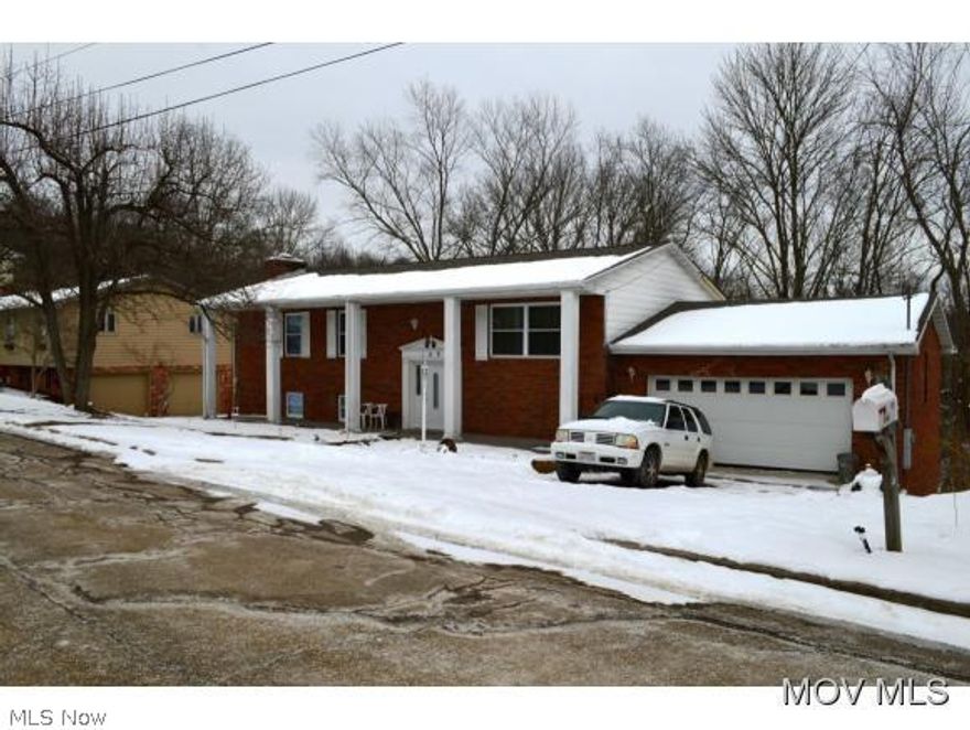 This home has been 95% redone in the last 9 months.  New roof, windows, HVAC, electrical, plumbing, new maple kitchen cabinets with self closing drawers and new appliances, French door off eating area of kitchen takes you to back deck over looking woods or open to living room, master suite with new full bathroom, 2nd full bath completely redone, new carpet, paint, and engineered hardwood floors. Spacious family room in basement is l-shaped 13x25x13x13 and offers door to lower back deck, in additional to spacious rec room.   Move in ready! Interior of home is brand new!  Elem: Putnam Elementary School  Elem/Bus: N  JrHigh: Marietta Middle School School  JrHigh/Bus: N  High: Marietta High School  High/Bus: N  Fire: CIT  Police: CTY  ;SQFT=Fin L1:1392, Fin Bsmt:1280, Fin Above:1392, Fin Total:2672, Unfin Bsmt:140, Unfin Above:140;GAR= 2 Car Att, Opener(s);PRKG= Off Street, Parking Pad