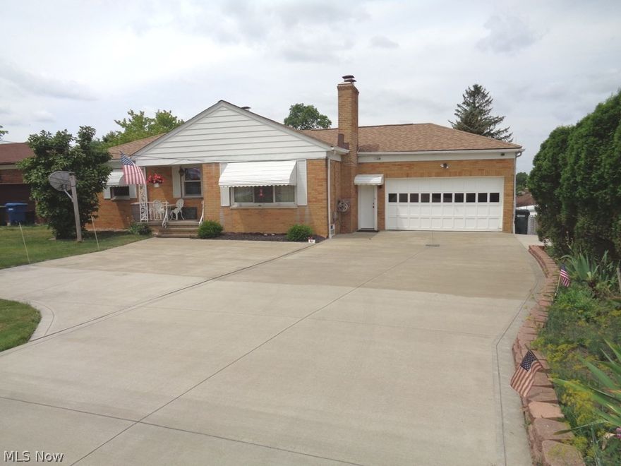 Welcome home to this all brick One-of-a-Kind 5 BD, 3.5 BTH Ranch w/ a Private Suite! Private Suite has separate entrance, eat-in kitchen w/ appliances, living area & BD w/ full BTH. Home sits far back off the street & features new double wide driveway (2013) w/ turnaround! All new vinyl windows (2011)! New Roof (2010)! Newer carpet (2013) throughout 1st floor w/ hardwood underneath! Great Room features wood burning/gas/electric fireplace, cove ceilings & fan. Formal dining room & eat-in kitchen separate the owner's bedroom from others. Eat-in kitchen boasts granite counter tops, breakfast bar, 2 pantries, all appliances & space for a large table! Owner's bedroom has private views, dual closets & a 1/2 bath! Walk-out lower level features additional living suite, huge rec room w/ wood burning fireplace, dry bar & entertaining space, plus laundry, wine cellar/pantry, mechanical & workshop areas. Washer & Dryer stay! Glass block windows! Updated full bath w/ tile shower surround! Also on l