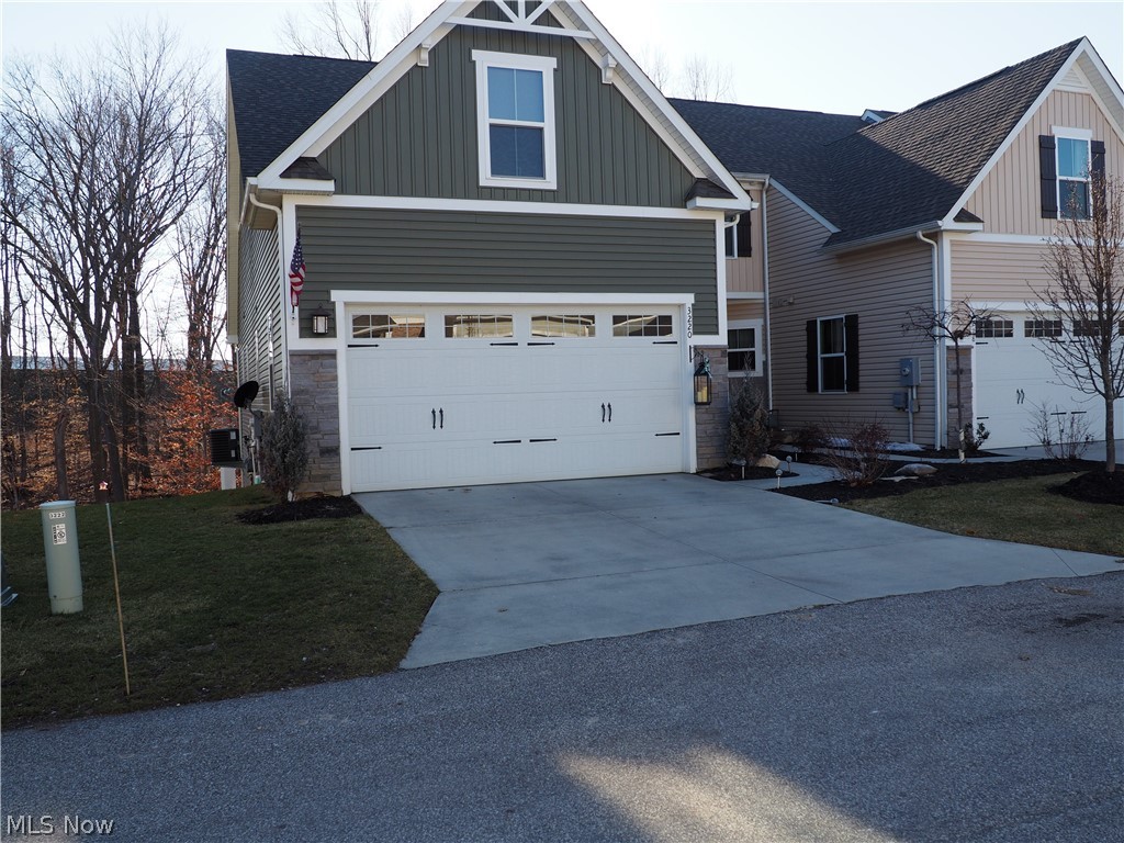 Much has been added to this lovely 4 bedroom, 3 1/2 bath Townhome since it was built. It sets on a quiet private drive close to extra parking for guests. The first floor has all you need with a great room that offers formal dining, a comfortable living room with a beautiful view of a Nature Preserve, a kitchen sitting area and a master suite with a large bath and walk-in closet. Ceiling fans in all the bedrooms add to your comfort. A first floor laundry. Your guests will be charmed when entertaining on the 12 x 20 deck overlooking the scenic winding stream and Nature Preserve or on the 12 x 24 patio with stamped colored concrete easily accessed from the finished lower level walk-out. A full second kitchen on this level makes entertaining inside and outside a pleasure. It can also serve as a workout room, man cave or an amenity rich guest suite. Topsoil was added to the side and back yard along with a front and back sprinkler system to help maintain a healthy lawn. With a low $100 a mon