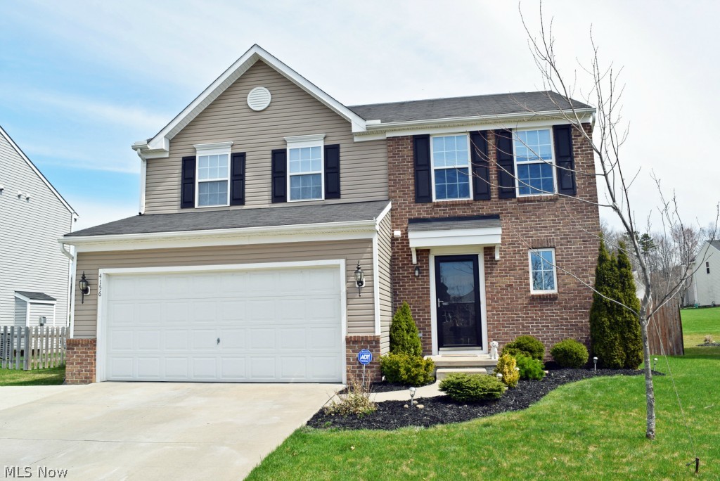 Welcome to your new home! Fabulous brick front-elevation with extra wide driveway for extra parking. Open floor plan for comfortable living! First floor includes foyer, half bath, mudroom, living room, dining room and kitchen. Kitchen includes stationary island and large corner pantry. Dining room opens to the spacious deck through patio slider, backyard is completely fenced with a wooden privacy fence. Second floor includes large master suite with private bathroom and large walk-in closet, two additional bedrooms, additional full bathroom & a spacious laundry room. The basement is beautifully finished and adds approx. 400SF of finished living space and tons of storage. High-efficient gas furnace to keep utility costs low! This home is a must see to appreciate! With the all upgrades from the brick front, extra parking, finished garage, the fenced backyard, deck and finished basement, this one has everything on your list! Call today to schedule your personal showing!