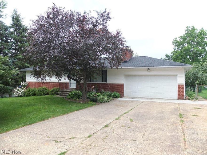 Desirable 3 bedroom, 2 full bath ranch with finished walkout lower level! Spacious living room with gas fireplace and picture window. Fully applianced kitchen with pantry, new floor in 2013 and newer appliances including oven, range, refrigerator, dishwasher and microwave. Dinette has new laminate floor too. Master bedroom has double closets. Bedroom 3 has hardwood floors. Full bath with tile floor and oversized vanity. Finished walkout lower level with bar, fireplace and full bath! Lower level has been waterproofed and comes with a warranty. 3 season room has perfect views of the large, fenced backyard with tiered deck. Fully applianced including washer and dryer! 2 car attached garage and the roof is only 5 years old. This home has so much to offer!