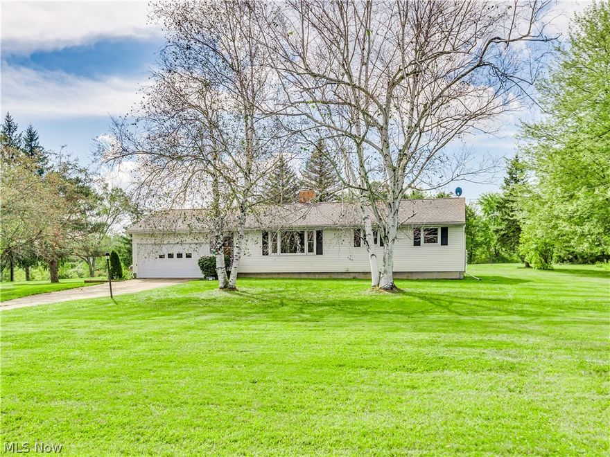 Ready for one-floor living and room to roam?  This is your answer. The 3+acre, beautifully manicured lot is perfect for the family barbeques, or to just relax and observe nature.  From the large backyard deck, you will enter the eat-in kitchen. The kitchen and living room share a gas burning fireplace for those chilly evenings.  The first-floor laundry is conveniently located off the eat-in kitchen.  All of the major updates have been done already: Home Roof (2012), Detached garage roof (2019)  Hot water tank (2017), Garage door opener (2015) Waterproofed basement from the outside of the foundation (2008),  Natural Gas was run from the street to the home (2018)  Gas fireplace reworked (2018) Furnace and AC both in (2003)  Septic approx 14 years old and maintained regularly. The bathroom was updated with a new tub surround. The basement is tall, bright, with lots of room for storage.  Outside you will find a LARGE (24x40) additional garage built-in 1999 with a cement floor. The barn is