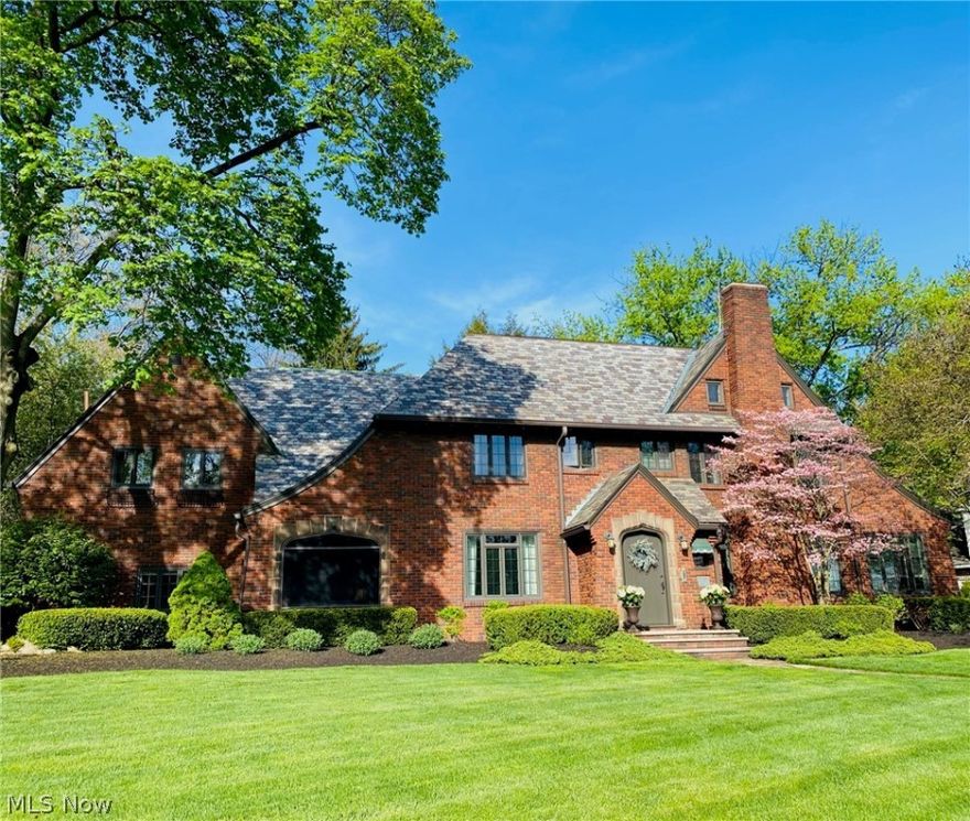 This home is simply beautiful! This slate-roofed Tudor with one of the most beautiful landscaped yards in Akron is available to be your new home. This home has been lovingly updated so that it retained its old world charm. Extensively renovated kitchen just completed May 2022. Includes Gourmet Fisher & Paykel stainless steel refrigerator and range. The natural light and symmetry of the architecture is just one of the many details to be appreciated. Decorative garden pond is home to 13 fish and several tadpoles! Replaced 25 windows in 2021.