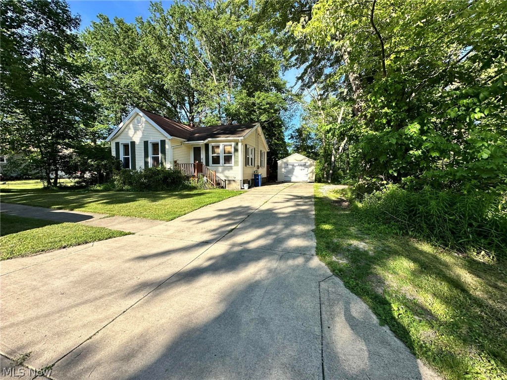 Located in the Ashtabula Harbor, this cozy bungalow provides a warm welcome with every turn! Whether you're a first time home buyer, investor, or planning for retirement, this adorable home is perfect for you! Conveniently located within minutes to various amenities but, tucked away on a large corner lot in a quiet + low traffic neighborhood. This 2 bedroom home also features many recent updates include: windows, AC unit, furnace, ceramic tile in bathroom, and an upgraded kitchen with new cabinets, countertops, ceramic flooring, and appliances. Step inside the front entrance of this home and you're welcomed by the spacious living room with beautiful hardwood floors and woodwork, the living area is also open to the dining room, which connects to the space-saving laundry area w/ a stackable washer & dryer, and continues through to the bright galley style kitchen. Separating the dining area and kitchen is the back entryway leading to a multi teared deck overlooking the large backyard with surrounding mature trees- perfect place for entertaining or relaxing! Back inside, the living room also connects to a short hallway leading to the remodeled full bathroom, and two generously sized bedrooms with ample closet space! Other key features of this home include the paved driveway, newer and expansive utility shed large enough for a lawnmower, motorcycle, or a car! The framed utility shed sits on the extended concrete driveway and measures 14x24 with an overhead door and man door. The multi-teared deck with tall privacy walls and electric power hookup is ready for a new hot tub! The home has a full walkout basement also! This home and property would make the perfect addition to any investors portfolio or would be a lovely place for anyone to call, "home." Schedule an appointment to see all the charm and potential this home has to offer! Sold as is, cash or conventional financing.
Appliances included: Newer Gas Range, Refridgerator, Microwave, stackable washer and dryer