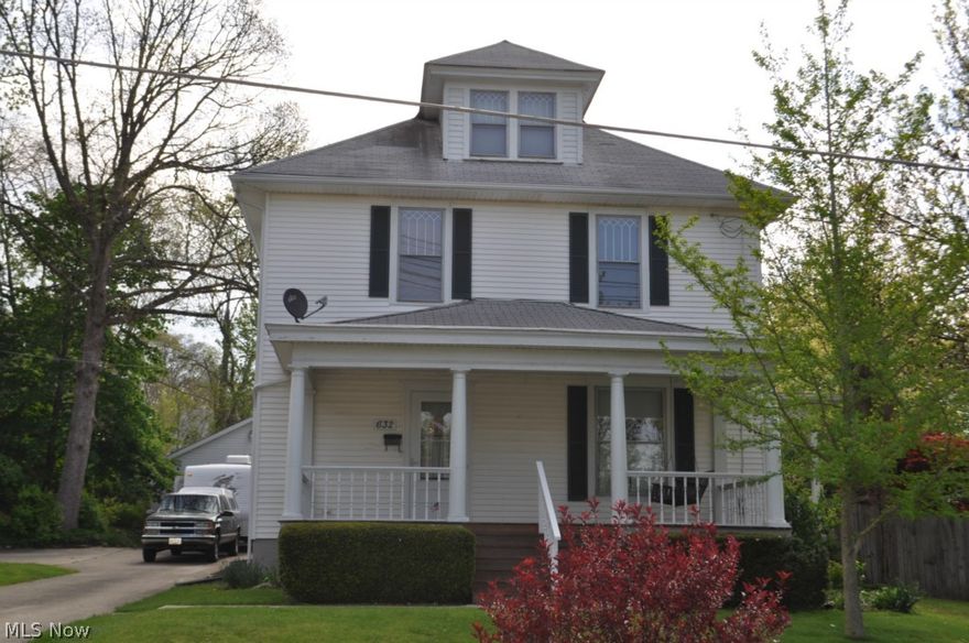 Beautiful 1908 Home ~ rich with history.  This nicely preserved and much loved home is full of original oak and oak wood trim throughout.  Present owners have maintained the historical dignity of the home as much as possible.  The minute you walk through the front door into the Foyer you will be amazed with it's 1900's beauty.  There is a newly installed first floor half bath off of the back family room, which overlooks the large fenced in back yard~double lot.  The first floor also has a formal dining room with a bay window, a living room with vent less gas fireplace(original woodwork), nicely updated kitchen, family room, and open door staircase to front foyer and second floor staircase.  The second floor has three very nice sized bedrooms and a bonus room with walk up to usable attic room.  Also the second floor bedroom has tiled floor and shower and unique vanity. The house has a big driveway and an oversized two car detached garage.