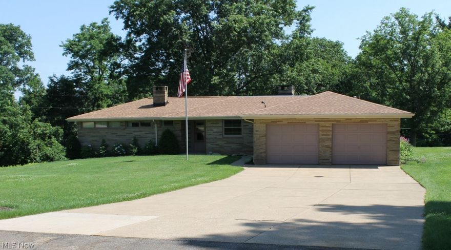 This well kept all brick ranch sits on a beautiful nearly 1/2 acre lot with treed backdrop. It offers 3 bedrooms with a possible 4th bedroom in the basement, 1 1/2 baths ( plus additional commode in basement) & 2 car attached garage. the foyer entry leads to large living room & family room addition each featuring floor to ceiling picture windows to enjoy the lovely setting. All kitchen appliances will remain. Updates in the last 6 years include roof 2014, electric range 2014, 200 amp electric service 2013, garbage disposal 2013, microwave 2012, hot water tank 2009, reverse osmosis drinking water system 2009 & central air conditioning ( family room addition has a window unit). This home has much potential!