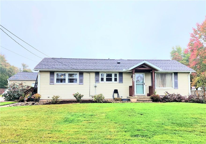 Modern and updated throughout with ample kitchen and dining space, three bedrooms, two full baths, and a first-floor laundry. The lower level has a separate recreation area with walk-out. Located on a corner lot with a large, detached, two-car garage. Set up your private showing today.