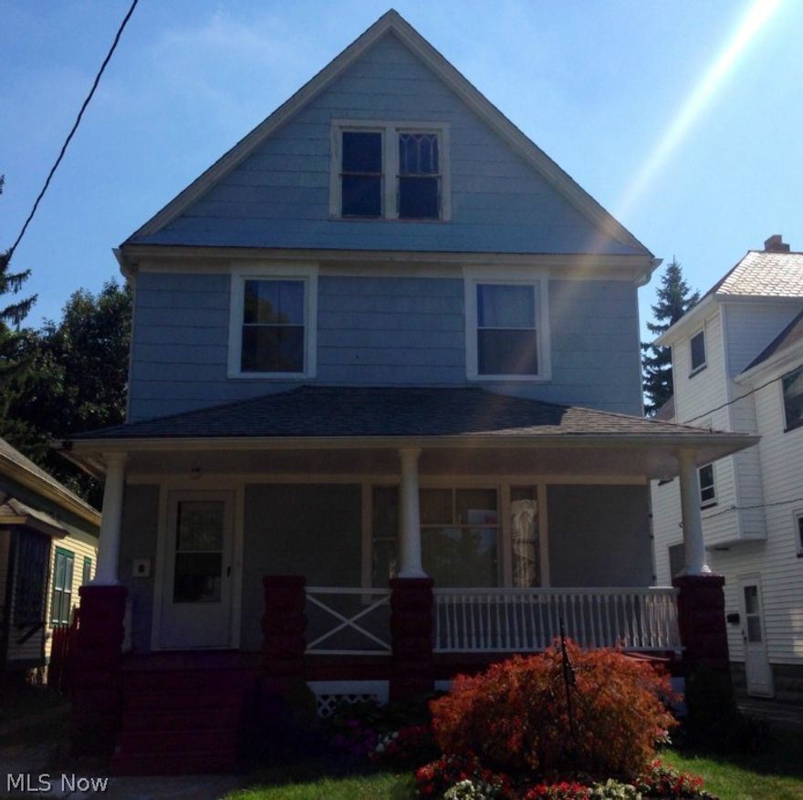 This inviting updated colonial has a lot to offer! Thru staircase and natural hardwood woodwork throughout. The spacious kitchen has been updated with a beautiful backsplash, counters and cabinets. The large dining room offers original window seating leading into the large living room with the original fireplace. Up the thru staircase you'll find a great master bedroom with a huge walk in closet complete with a porch. 2 more spacious bedrooms and an updated full bath with a soaker tub. Plenty of space for storage in the walk up attic as well as basement that has a walk out. Don't miss out on this true pride of ownership. Come take a tour today! This home is one of seven homes that offers a driveway on Woodbridge. Just minutes from downtown, Tremont and Ohio City!