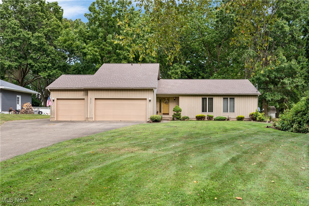 If you can a $400,000 home, you have probably looked at the feasibility of new construction. The cost to rebuild this 1993 home would exceed $600,000. The open concept floor plan was years ahead of its time. The over half an acre lot features some mature trees. Interior amenities include vaulted ceilings throughout, first floor laundry, three car garage, master bath with jetted tub and double vanity. Take the party downstairs in the large recreation room with pole table. Unlock the remaining space to be your dream fitness room.