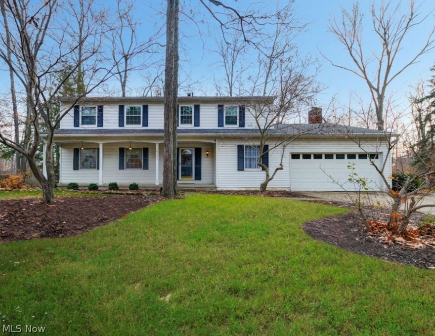 Welcome Home! This lovingly maintained and updated colonial home embraces you with open arms! Walking up to the front door you will be drawn to the deep front porch, taking you back to the time when life seemed so carefree... Step inside through a generous foyer, and feel the warm vibe of this home. The gracious living and dining rooms - filled with natural light - perfect for everyday relaxing, as well as for special occasions when your friends and family gather together. Off into the heart of the home -you will be inspired to pull out your favorite recipes and enjoy mealtime in the crisp white kitchen featuring stunning granite countertops and loads of cabinet and pantry space. Coffee and casual meals - so relaxing when you are at the kitchen table overlooking the deep deck and park-like back yard. The family room off of the kitchen is ready for cozy evenings by the fireplace with a cup of hot chocolate. Or - curl up with a book in the spectacular sunroom, your private oasis where yo