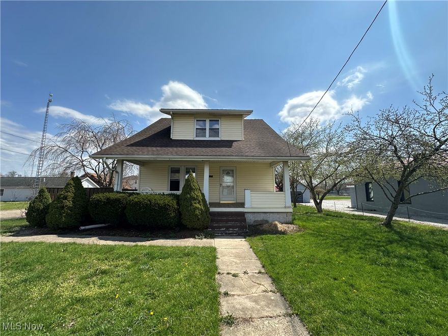 Nestled in a super convenient Malvern location, this well-cared-for older home offers a wonderful blend of classic charm and comfortable living. Step inside and be greeted by a spacious living room with cute built in, perfect for relaxing and entertaining. The formal dining room provides an elegant space for gatherings. You'll love the bright and airy kitchen, complete with a large pantry – a true bonus for any cook!  The thoughtful layout includes a convenient first-floor bedroom and a half bath, offering flexibility and ease of living. Upstairs, you'll discover three additional bedrooms and a full bathroom, providing ample space for family or guests.  Outside, enjoy the best of both worlds with a great deck, ideal for outdoor dining and enjoying the fresh air, plus a charming covered front porch, perfect for sipping your morning coffee. The oversized 2-car detached garage offers plenty of room for vehicles and storage.  Don't miss the opportunity to own this delightful home in a fantastic location!