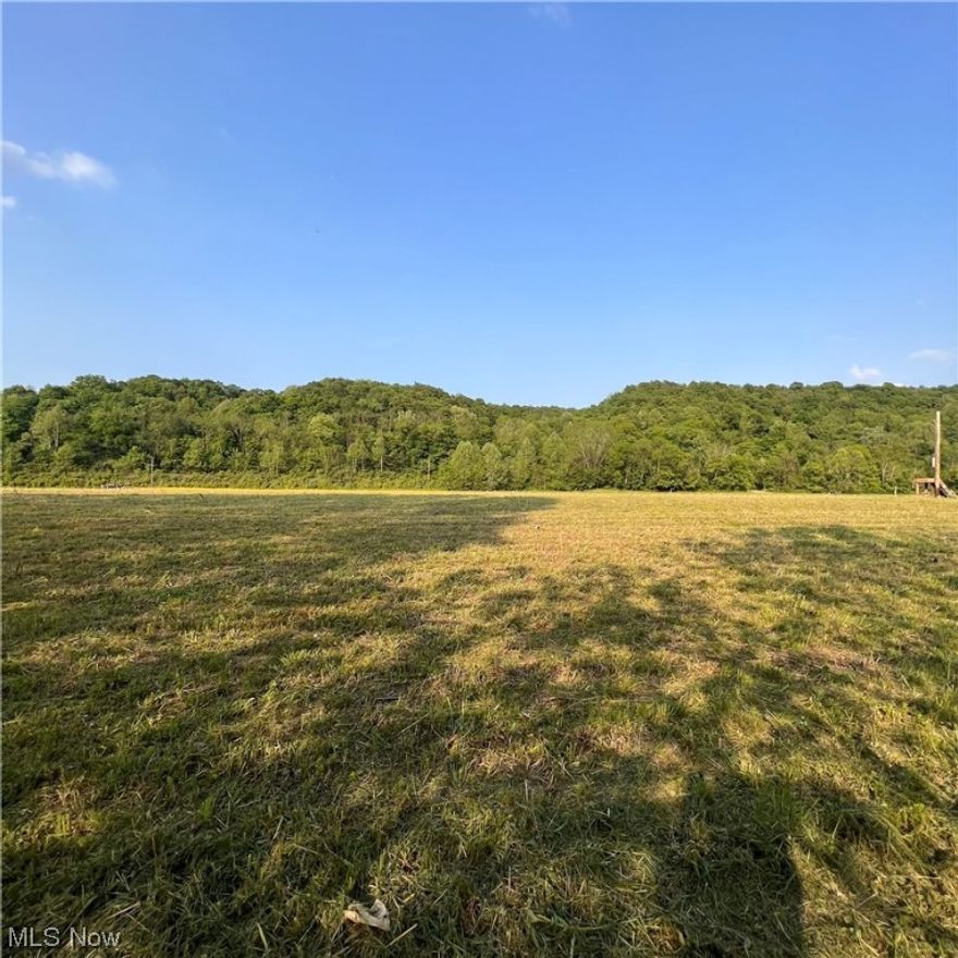 Rare opportunity-8+/- acres with over 500 feet of Little Hocking River frontage-just over 2 miles to public boat ramp. Electric service available, no deed restrictions, mineral rights transfer, new survey done-unlimited possibilities!