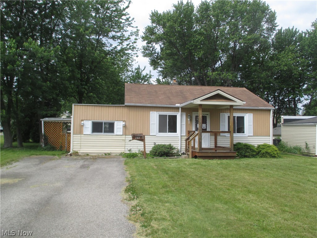 Nice two bedroom ranch home with newer laminate flooring and spacious rooms. Garage was converted into bedroom and could be converted back! Two bedrooms and one full bath. Nice deck to enjoy the backyard. Conveniently located near shopping, schools and freeway access. Come visit today!