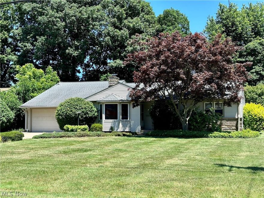 Excellent home for entertaining! Warm, inviting ranch style home features 4 bedrooms and 2 bathrooms with a fully fenced back yard. Primary bedroom off of the family room contains an en suite shower bath, potentially allowing in-law possibilities. The family room has French doors and a deck which overlooks the spacious and private rear yard.  All bedrooms have double closets for plenty of storage.  Newer HVAC and tankless hot water system.  Three car garage (two tandem) with back yard access to a cement pad that doubles as a basketball court offers many possibilities for jet ski or golf cart storage during winter months. Over the garage, there is a large partially finished walk-up storage space offering easy access or even an opportunity to create a loft studio.  Home is in a quiet neighborhood but close to everything Mentor offers. Lots to see here so make your appointment soon.