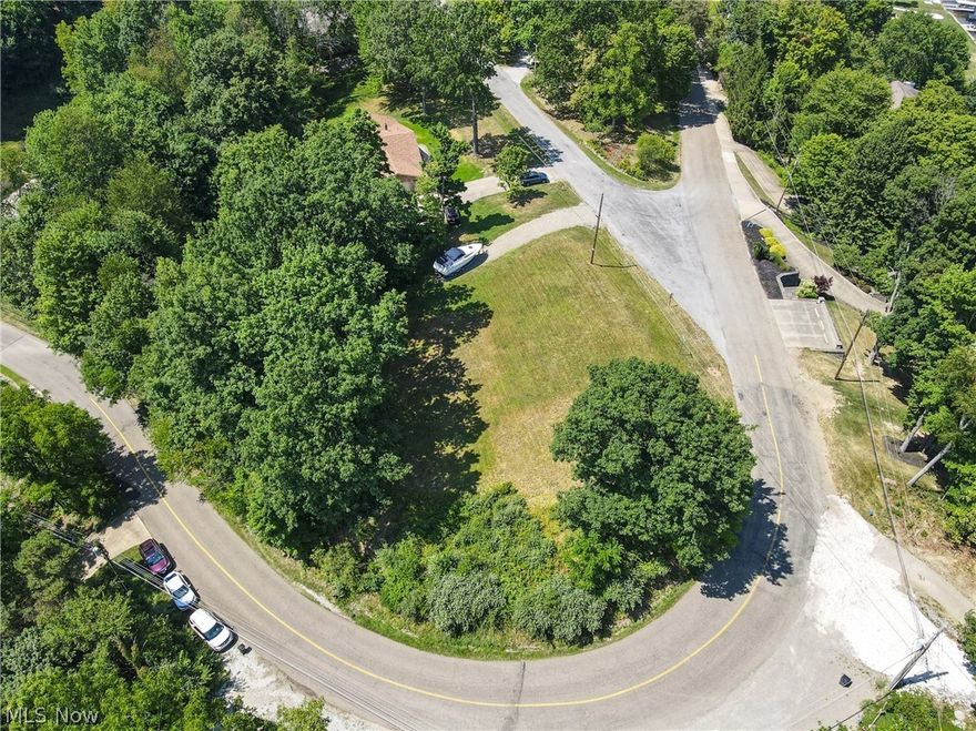 Amazing vacant lot with beautiful year round lake views and seasonal panoramic lake views!  Cleared and level along with a driveway.  All you need to do is bring your builder and build your dream home!!  Lake Mohawk is a private, gated community consisting of a 500 acre lake with unlimited horse power.  3 beaches, marina, tennis courts, sand volleyball court and a 9 hole golf course.  Start making memories at the lake today!!