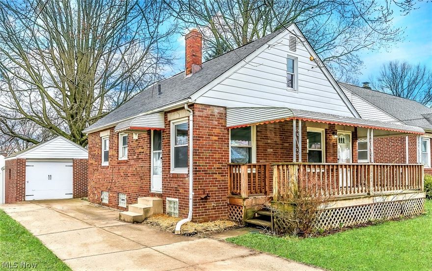 **Firestone Park ALL BRICK Beauty ~ 1,000+ Sq. Ft. Features 2-3 Bedrooms, Bathrm, Detached Garage & More! *Relax Outside On A Large COVERED Front Porch AND Wide Concrete Back Patio!! Both Are Perfect For Entertaining Outdoors W/Tons Of Space For Tables/Outdoor Furniture For Grilling And Gatherings! *Kids Playground Set W/Rock Climbing Wall In The Back Yard Surrounded By Fencing For "Your Own Space"! *New MODERN LUXURY Plank Water Resistant Flooring Throughout! *TWO - 1st Floor Bedrooms! *UPDATED KITCHEN Features NEW White Arcadia Shaker Style Cabinets W/Stainless Steel Oversized Pulls, BUTCHER BLOCK Countertops, Subway TILED Backsplash, Whirlpool Gas 5 Burner Stove W/Middle Griddle, Stainless Faucet & Sink! *Double Windows In The Kitchen & Both First Floor Bedrooms Provide Natural Light Throughout *Living Rm W/Black Ceiling Fan *FRESH Grey Painted Walls And White Crisp Trim Throughout! *1st Floor Bathrm W/Triple Sconce Light, Bathtub & Shower W/Subway TILED Surround & Dual Handheld/Reg