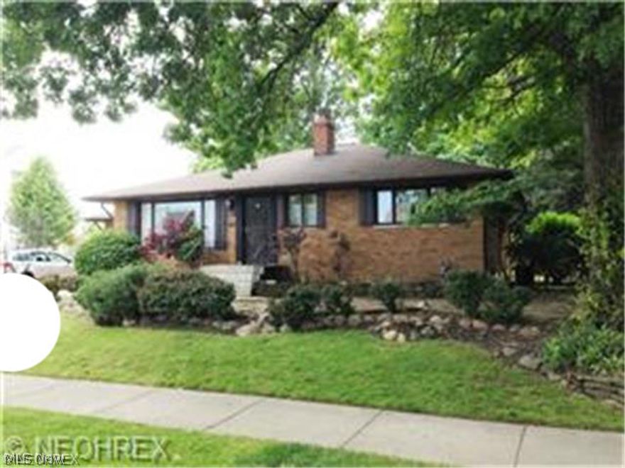 This all brick ranch is situated on a double lot and has a large living room with newer carpeting. There are 3 bedrooms & 1 bath on the first floor along with a large eat-in kitchen with access to the back yard. The entire home has been cleaned & painted. The basement has a large rec room with bar. The north wall of the basement will have to be rebuilt & there are estimates available. There is plumbing in the basement for a half bath.  This is the original owner who built this home.