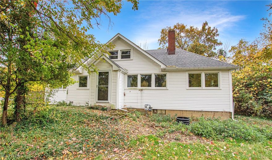 If you are looking for a LARGE home you can add your designer touches to- look no further! 239 Race Street in Berea is priced to SELL! Take a tour today before it's gone. This amazing home is located on an oversized and secluded lot yet close to schools, shops and restaurants. The property offers 2, 2 car garages, a teen or in lawsuit (change the home into a multi unit using your creative prowess) and a TON of storage! There are a total of 4 bedrooms, 2 full bathrooms and a half bath. This property is in need of some TLC including updating the electrical and mechanicals but provides the canvass for one of the most unique homes in the area.Good bones and character! Do not miss this opportunity!