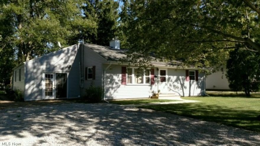 More In Condition with updated windows, vinyl sided, roof, furnace, breaker box remodeled, bathroom and kitchen, new back porch and landscaping. Updated outbuilding for a workshop