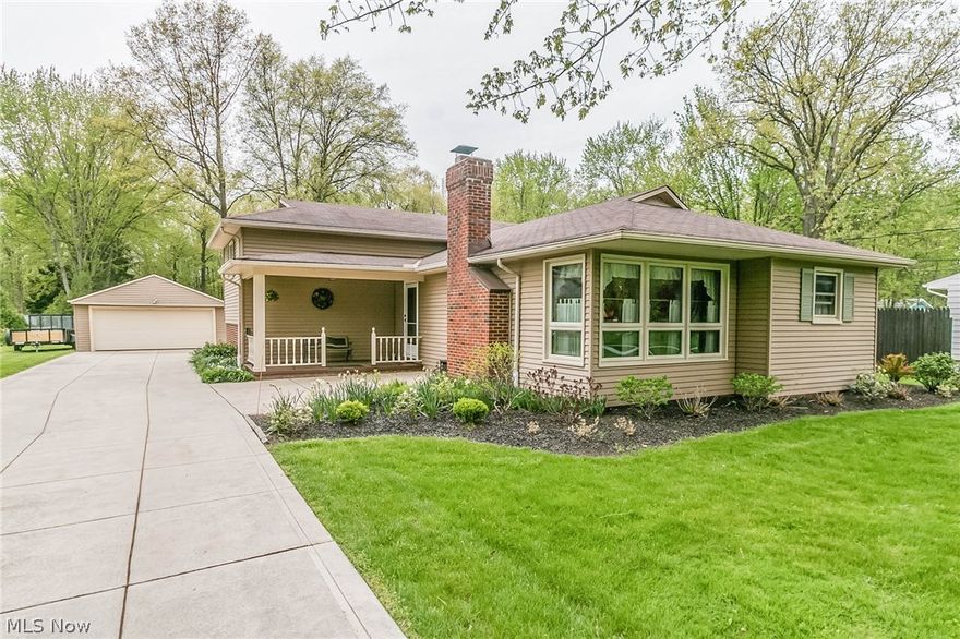 Welcome Home to 31400 Hilliard Blvd.  Nestled near the end of a tranquil street in the southwest corner of Westlake, with convenient access to the Turnpike, I-480, I-90, & I-71, making for a short commute to surrounding communities, or opportune avenues to revel in all the shopping, restaurants, and entertainment areas like Crocker Park & Avon Commons have to offer.  This charming, 3 bedroom, 1.5 bath split-level is sure to impress at nearly 2,400 finished sq. ft., situated on 3/4 of acre, offering that country living feel, within the city limits.  Upon arrival, you'll be greeted by the beautiful brick/aluminum facade, extended paved driveway (2011), concrete trailer/boat pad (2015), meticulously manicured grounds (2015), and oversized 2-car detached garage with newer garage door/opener (2011) and an additional 20 x 12 workshop added on the back.  The moment you walk through the door, you'll be in awe of the refinished hardwood flooring throughout, Wilson art wood-laminate flooring in