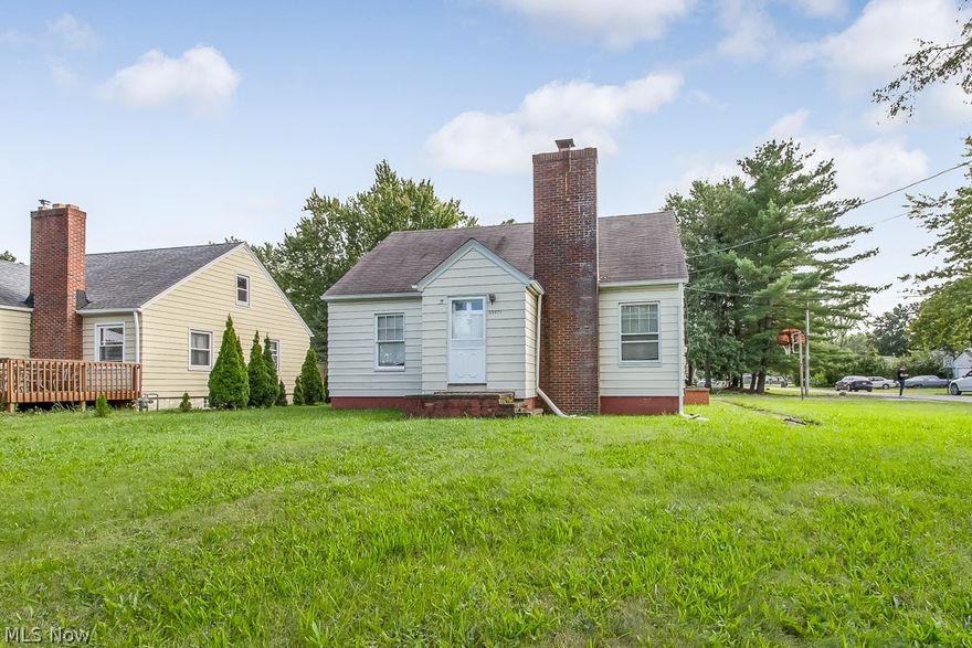 This Cape Cod/Bungalow offers over 2,000 sq ft above grade with prime hardwood flooring throughout. 4 total bedrooms and 3.5 bathrooms total. Corner lot with driveway entrance on side street to avoid main street traffic. One of the largest floor plans in the area. Great investment opportunity. Handyman special.