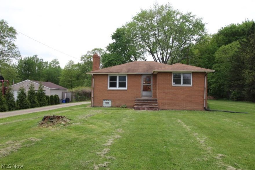 Situated on an acre and located in West Branch School District, this 2 bedroom brick ranch has a spacious living room with fireplace, and inviting kitchen with appliances.  Full basement and large back yard.