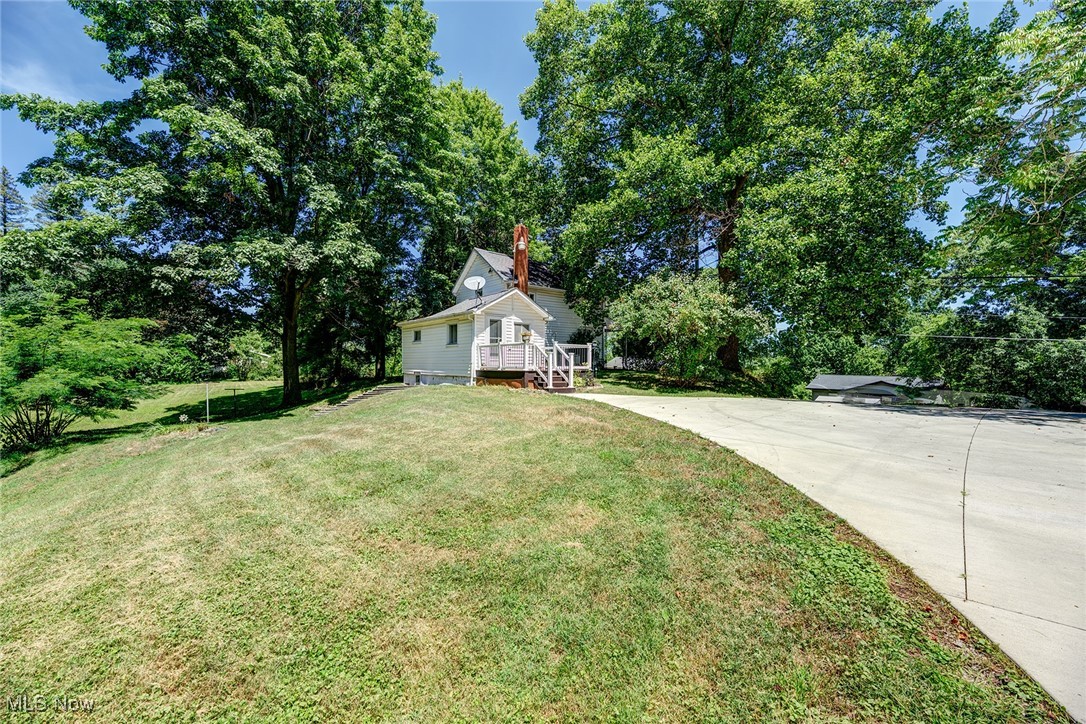 Charming Akron Home with Room to Roam! Nestled on a generous, gently sloping 1.23-acre lot with beautiful mature trees, this inviting 3-bedroom home offers the perfect blend of comfort, convenience, and space. Located in a peaceful area of Akron, the property boasts a large concrete driveway, with tons of parking, leads to a well-appointed garage—ideal for car enthusiasts or extra storage.
Step inside and you’ll find a kitchen designed for functionality, featuring plenty of cupboard space to keep things organized and clutter-free. The newer porch is perfect for enjoying morning coffee or hosting evening gatherings. The furnace, updated in 2020 and a whole house generator for added peace of mind!
Whether you're seeking a quiet retreat or a place to entertain, this home delivers. With ample outdoor space, there's room to garden, play, or even explore future expansions.