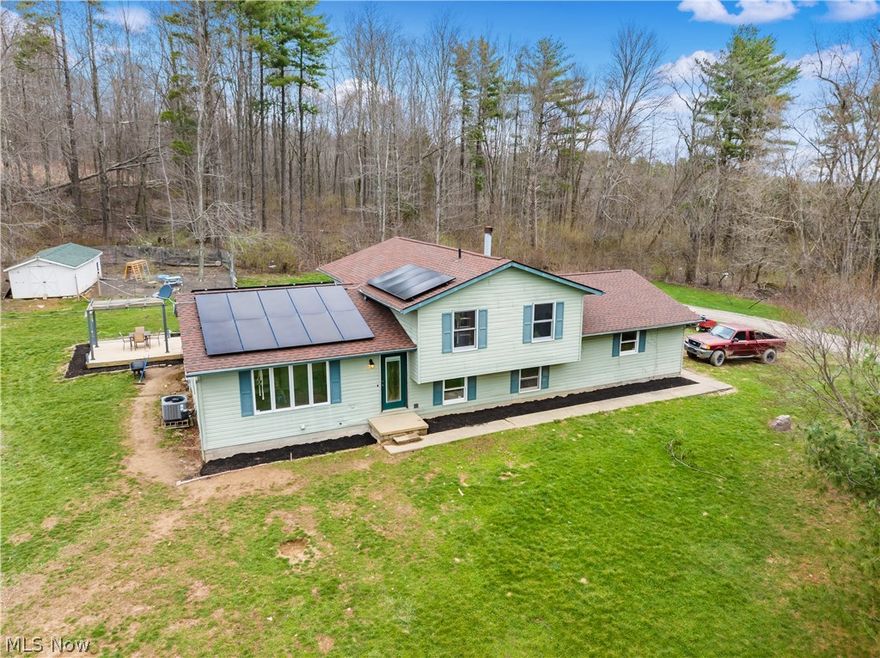 Located in Coshocton County, Ohio, this 10.05-acre property features a 2,804 square foot home with four bedrooms and three full bathrooms. The layout provides space for guests or a growing household. The home is all electric with no gas or propane service.

Recent updates include new flooring throughout, a new roof in 2023, a new roof on the sunroom in 2026, and a new water softener and reverse osmosis system installed in 2022. Solar panels were installed in 2023 and include a warranty. The driveway has been resurfaced.

The property includes a garage and a 30 by 40 pole barn with concrete floors, providing additional storage or workspace.

The property directly borders Woodbury Wildlife Area, offering access to approximately 30,000 acres of public land for outdoor recreation including hunting, fishing, and hiking