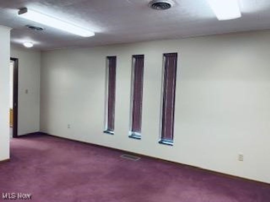 Convenient location for this stand-alone office building ready for occupancy. Located just off I 70 and US 40 one mile west of Cambridge.  5 offices, 2 restrooms, & a conference room. Gravel parking lot w/up to 15 spaces. Please call office for more details or for rental application. Tenants pay all utilities.