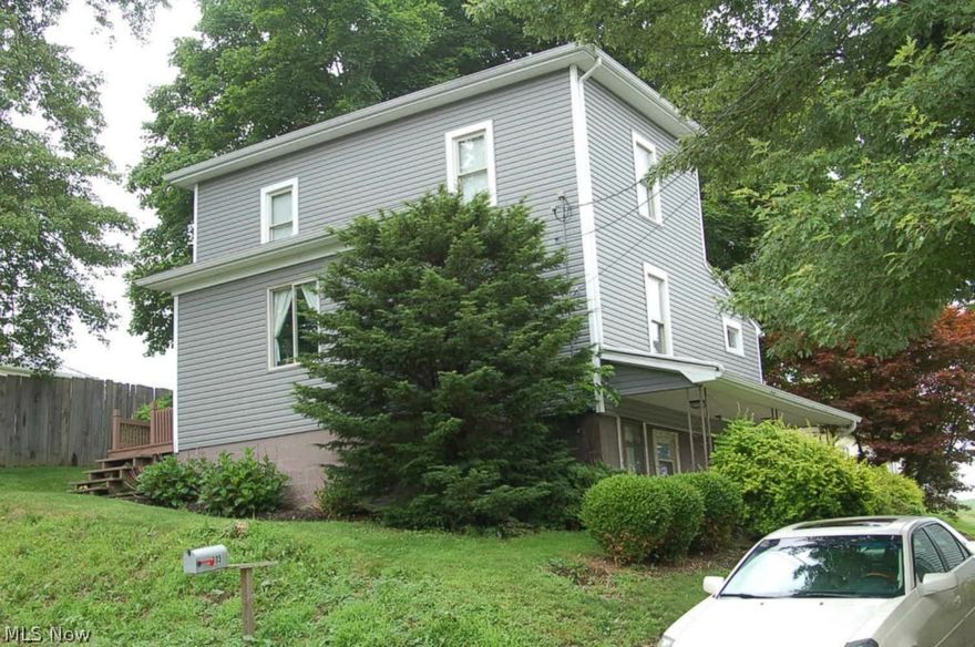 Greater starter home on 1 acre.  First floor has kitchen, full bath, living room, dining room and den/office.  The two bedrooms are on the second floor.  Home has been very tastefully painted and decorated and shows well.  Walkout basement with tons of storage space and laundry room.  New siding and roof fall of '13.  Property also has 24'x37' detached garage with electric.  Call today for your personal showing!