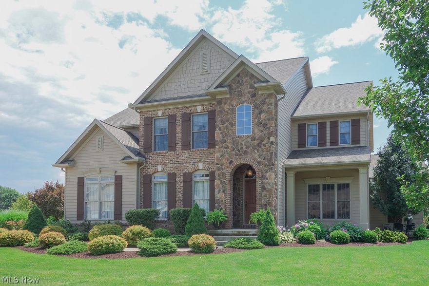 This immaculate, professionally-designed colonial with a private veranda invites comfort and exudes modern elegance.  With 4 bedrooms, 2 and half baths, generous living space and stylish finishes, you'll enjoy a perfect setting for relaxing and entertaining. Spa like master bathroom is not to be missed with a fireplace, Jacuzzi tub, and walk-in shower, plus spacious his and her walk-in closets that are every woman's dream!  Stainless steel appliances, granite counter tops, and stunning décor in the kitchen. Plenty of space to get away in your own private paradise in the study, outdoor living room or elegant patio. Located in Emerald Estates in beautiful Jackson Township.  Call for your viewing!