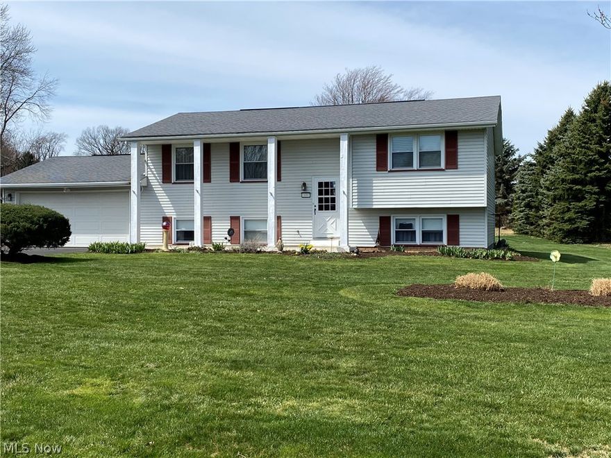 Well maintained, this spacious 3 bedroom home with two newly updated stunning full bathrooms, large office and a large family room make this a wise choice.  Eat-in kitchen complete with refrigerator, stove/oven, dishwasher, microwave, and unique easy-to-operator slider drapery offers relaxing view to backyard through the seasons.  Lots of natural light, quality updates through the years, fresh neutral decor, easy care flooring, landscaped acre lot for all types of outdoor activities, concrete BBQ patio, composite deck, many beautiful perennials.  Handy foyer entrance, tall ceilings, water softener, washer and dryer included, 100 amp electrical service, central air, 2 car attached garage, and gutter guards!  Lake schools, Stark county, Uniontown address location.  Home warranty and immediate possession offered. Check out this super clean, cheerful home soon on a very quiet street.