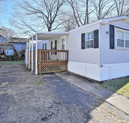 Well maintained home in the hidden Mobile home, community of Stow Estates! Why pay rent? This home is low in maintenance and has extras! This is spacious home that might be the perfect for you! This is a 1997 model and has a double lot Covered Deck and a nice storage shed. Seller is leaving all the appliances as well including Washer & Dryer! The monthly maintenance fee of $434 is for lot rent and this fee also takes care of trash removal and Snow removal. There is a children's park, a basketball court and a dedicated pet area in this community. Enjoy all that the City of Stow has to offer including schools, parks and loads of convenience shopping.