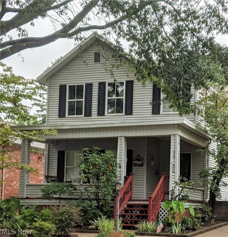 SELLER SAYS MAKE AN OFFER for this charming in-town home location close to Washington Elementary School and the Public Library this century offers modern conveniences including a home office, custom eat-in kitchen, large first floor laundry with extra cabinets, spacious first floor bath with access to the deck and hot tub. The living room has a gas log fireplace with remote. A dining room is located between the living room and kitchen, making entertaining easy. The split staircase is accessed from the foyer or the hall off the dining room. Upstairs is a spacious master suite with private bath, a dressing area, and walk-in closet. There are two additional bedrooms, a full bath, extra storage room and a cedar closet. Enjoy summer evenings on the front porch swing or relax on the rear deck or in the hot tub. The 2 car garage has bonus finished room, perfect as a home office or craft room. Maybe you need a man cave or a teen hangout - it works for those needs as well. There is a