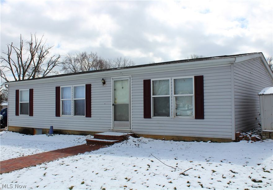 Tucked away on a private lot this THREE bedroom, TWO full bath  home  is an excellent opportunity to OWN for less than your monthly rent is costing!!!  Offering a master suite with walk-in closet, open concept living/dining area, convenient laundry area.  New A/C unit, roof replaced approximately 6 years ago.  Rear patio with built in benches offers endless privacy for those family bbqs or  quiet evenings in the swing.