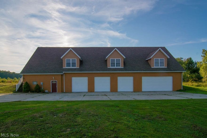 1 Year Home Warranty Included with Purchase! An excellent investment awaits you!  Nearly 4000 SF raised ranch on scenic 6.7 acre nature lovers retreat with pond. Lower level has a 12 car heated garage with four 9' garage doors, radiant floored heat, 1/2 bath, 220 lines ideal for car mechanic/ car enthusiast/ workshop/ landscaping business/ home business. Home has a huge great room with vaulted wood paneled ceilings. Spacious kitchen with Corian countertops and cherry Kraftmaid cabinets. Extra den (possible 4th bedroom). Large master suite with glamour bath, garden tub and pool shower. French doors lead to huge Trex deck. Set back to 250' off the road on concrete drive with solar panel lights. Welcome to this wonderful lifestyle!