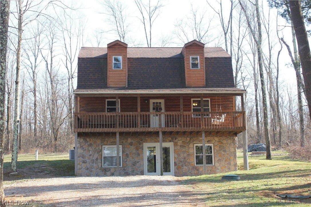 Spectacular! This cabin is super clean, private, spacious and is looking for a new owner. This home is the perfect getaway or live here year round. This home boosts 3 levels of living spaces which includes 3 bedrooms, 2 full bathrooms, open living room, dining, kitchen and a full basement. The second floor has the bedrooms and full bathroom. Two of the bedrooms are large with newly built closets and high ceilings. The other bedroom is smaller but could fit a twin bed or is perfect for an office. The main floor is an open floor plan consisting of a beautiful kitchen, dining room, living room and full bathroom. There is a full unfinished basement that was just Dry-locked and is ready to be finished. This home is perfect for entertaining with family and friends as you have a big deck off the front and rear of the home. You can enjoy the outdoors while sitting around the Fire-pit and having wonderful wooded views of the private 3 scenic areas. This home has newer carpet and laminat