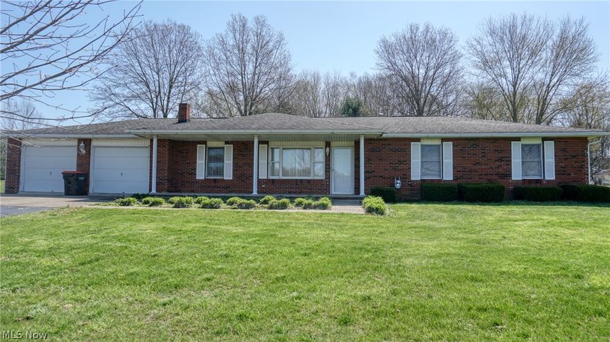 Meticulously maintained 3 bed 3 full bath brick ranch home nestled up on top of 8.55 acres of beautiful rolling hills. Over 2900 square feet of finished living space! First floor boasts a fully equipped kitchen with gorgeous granite countertops and dining room site-line, main floor laundry, 3 bedrooms and 2 full baths including master suite with tiled floors and showers. Also on the main floor, your generously sized living area sized at a whopping 720 sf which walks out to the 3 season room and sprawling concrete patio! Finished basement includes full kitchen and full bathroom, perfect for in home rental. Property includes 2 buildings.