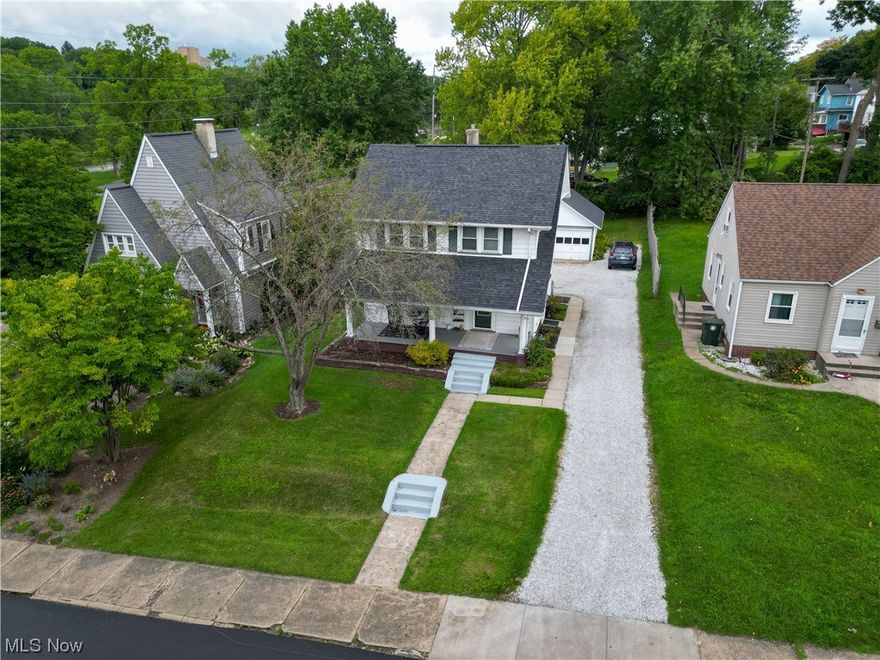 Super clean well cared for 2 story that views Monument Park's pond with fountain from backyard and McKinley Monument! Large rooms throughout, full basement, walk-up attic, 1/2 bath on first floor, excellent kitchen with island w/dishwasher, lazy susan/pull out drawers. Large backyard! Two car garage with electric and security light, loft for storage. Quiet private back yard.