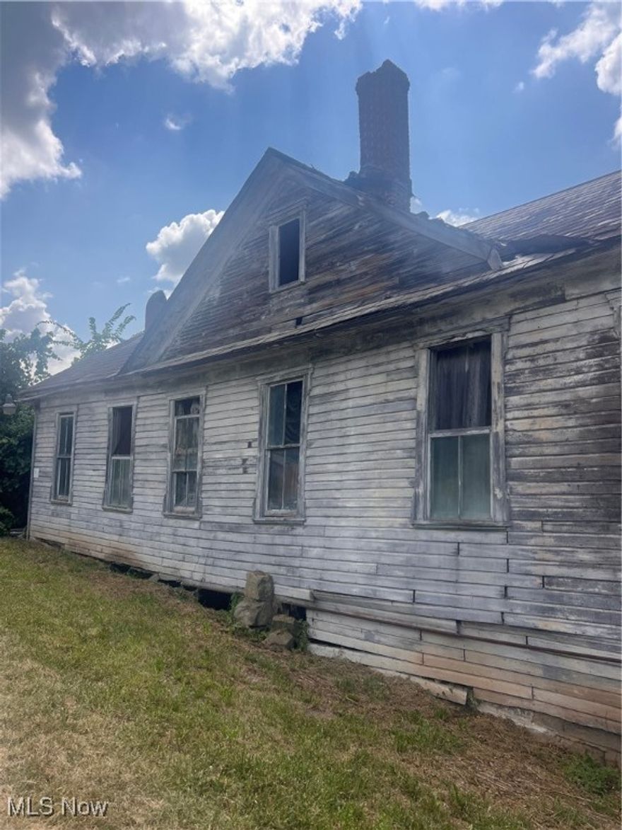 2 lots, 1 across the road from the other. Old building on 1 lot. Utilities available at the road according to seller.