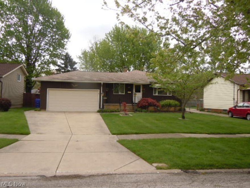 Beautiful Ranch With Attached 2 Car Garage and Lots Of Curb Appeal! A Quaint Front Porch Greets You As You Enter This Well Maintained Home. Stunning Hardwood Floors Highlight All the Main Floor Living Areas. The Kitchen Comes Fully Applianced and Includes A Newer Stainless Steel Fridge! The Main Bathroom Features Ceramic Tile Flooring. You Will Be Impressed With the Huge Basement Rec Room Complete With Bar, Bar Stools and Glass Block Windows. The Basement Has a Half Bath As Well As A Stand Alone Shower. Beautiful Ceramic Floored Sunroom Looks Over the Backyard, Which Has A Shed. Updates Are Dimensional Shingle Roof, Andersen Casement Windows & Hot Water Tank. This Is A Beautiful Place To Call Home!