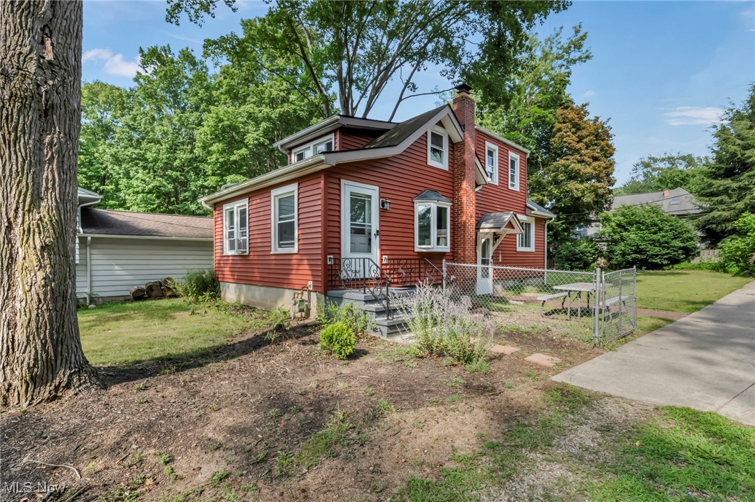 Welcome to this charming home nestled on a private, wooded 0.46-acre lot in desirable North Olmsted. This home features three bedrooms and two full bathrooms, perfect for comfortable family living. The home boasts recent upgrades, including a fully renovated second floor with new electrical, plumbing, insulation, and drywall completed in 2024. Additional improvements include vinyl siding, new windows installed in 2020, an upgraded 100-amp breaker box, and a new roof in 2019, ensuring long-lasting protection. The basement is partially finished with bright glass-block windows, providing extra space for recreation or storage. The kitchen and laundry appliances—washer, dryer, refrigerator, range/oven, and dishwasher—are all included and were updated in 2018. In 2024, the kitchen received fresh updates with new flooring, countertops, and a stylish backsplash, adding modern elegance to the heart of the home. Heating is provided by forced-air gas, and the home sits on a peaceful lot with mature trees that create a serene, country-in-the-city atmosphere. Outside, you’ll find a spacious 2.5-car detached garage and a paved driveway for ample parking. Located just minutes from Bradley Reservation, this property offers easy access to scenic trails and outdoor recreation. Families will appreciate the top-rated North Olmsted City School District, with excellent nearby schools including Forest Elementary, North Olmsted Middle, and High Schools. This home combines classic charm with modern updates; all set in a quiet and welcoming neighborhood. Don’t miss the opportunity to make this well-maintained property your new home!