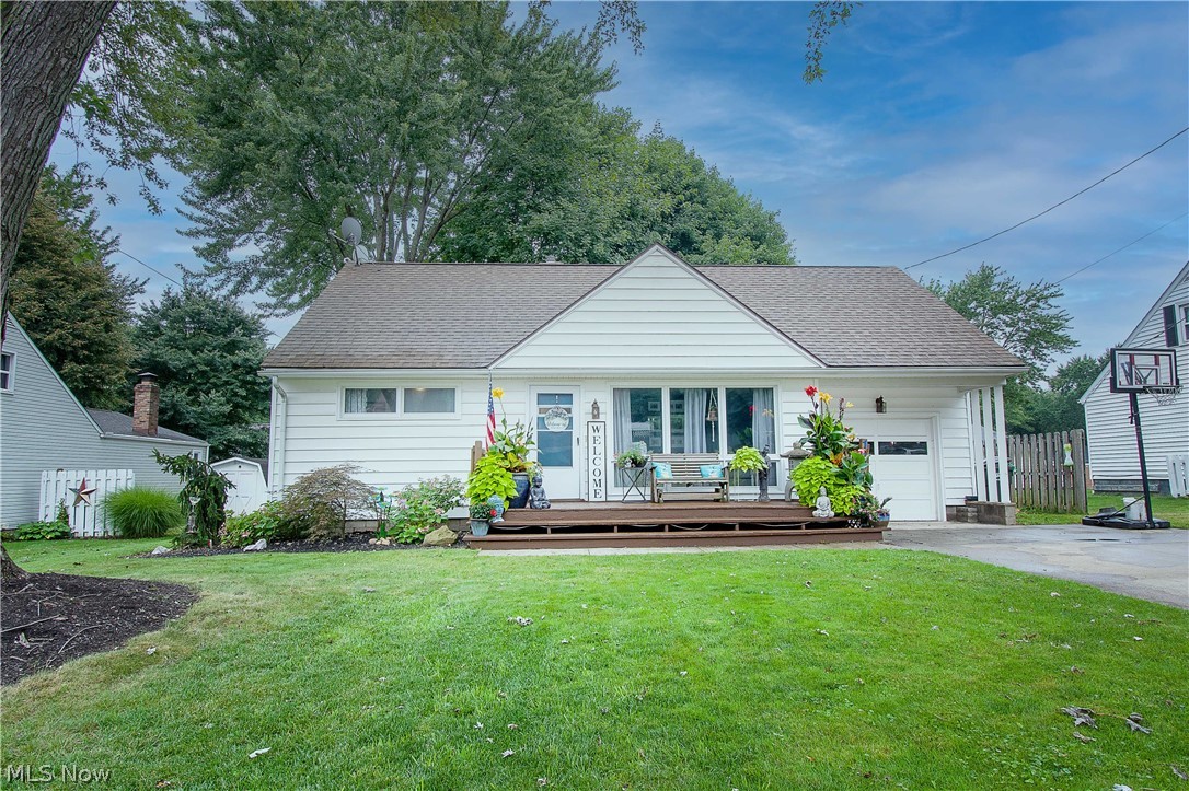 Welcome to this updated and extremely large bungalow in N. Canton city schools. As you arrive you'll step on to a beautiful front deck perfect for Summer evenings. Enter the front door to pristine hardwood floors, a large living room, and built-ins perfect for anyone who loves to decorate. The kitchen offers updated cabinets, granite counters, a tile backsplash, and is fully applianced. Off of the kitchen you'll enjoy a very large dining area, a sunken family room, and a 3 seasons room (easily converted to a 4 seasons room) currently being used as a playroom/work out space. Two bedrooms and a full bath with a granite vanity and tile bath/tub combo complete the first floor. Upstairs you'll find two more bedrooms, a 1/2 bath with granite counters, and plenty of storage space. The basement has two semi-finished spaces, a laundry room, and another full bath. Close to restaurants, 77th, schools, and Belden Village, you'll never run out of things to do! Book your showing today before