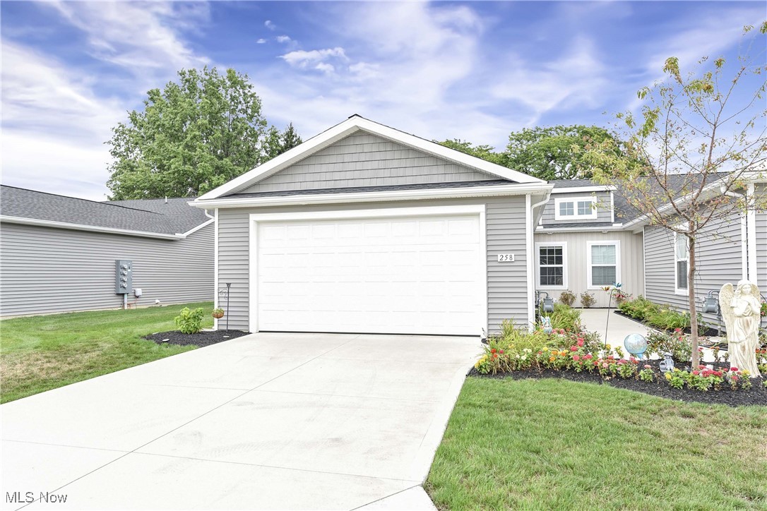 Welcome to 258 Silver Spring Circle in the sought-after Landings at Ridgewater community in Elyria! This stunning, one-owner ranch home combines the ease of first-floor living with stylish, modern upgrades and endless potential to make it your own. Featuring 2 spacious bedrooms and 2 full baths, this move-in ready gem showcases luxury vinyl plank flooring throughout, blending durability with high-end design.
As you enter the home, the foyer opens directly into the heart of the home, a beautiful open-concept kitchen—perfect for entertaining! You'll love the upgraded gas range, ideal for bringing out your inner chef. The kitchen flows seamlessly into the dining area, which opens into a cozy living room anchored by a warm gas fireplace. The sun-filled primary suite offers a peaceful retreat with a generous walk-in closet and a luxurious en suite bath featuring a large step-in shower. A second bedroom offers flexible space for guests, hobbies, or a home office, with a nearby full bath for added functionality.
Conveniently located just off the kitchen, the laundry area adds ease to your daily routine. As an end unit, this home offers added privacy and includes its own concrete patio—perfect for relaxing or entertaining. The attached two-car garage provides ample storage and convenience. Just a short drive from Midway Market Square, you'll have quick access to grocery stores, dining, and shopping. Move-in ready and full of potential to make it your own, this home is the ideal place to begin your next chapter in a vibrant, welcoming community.
